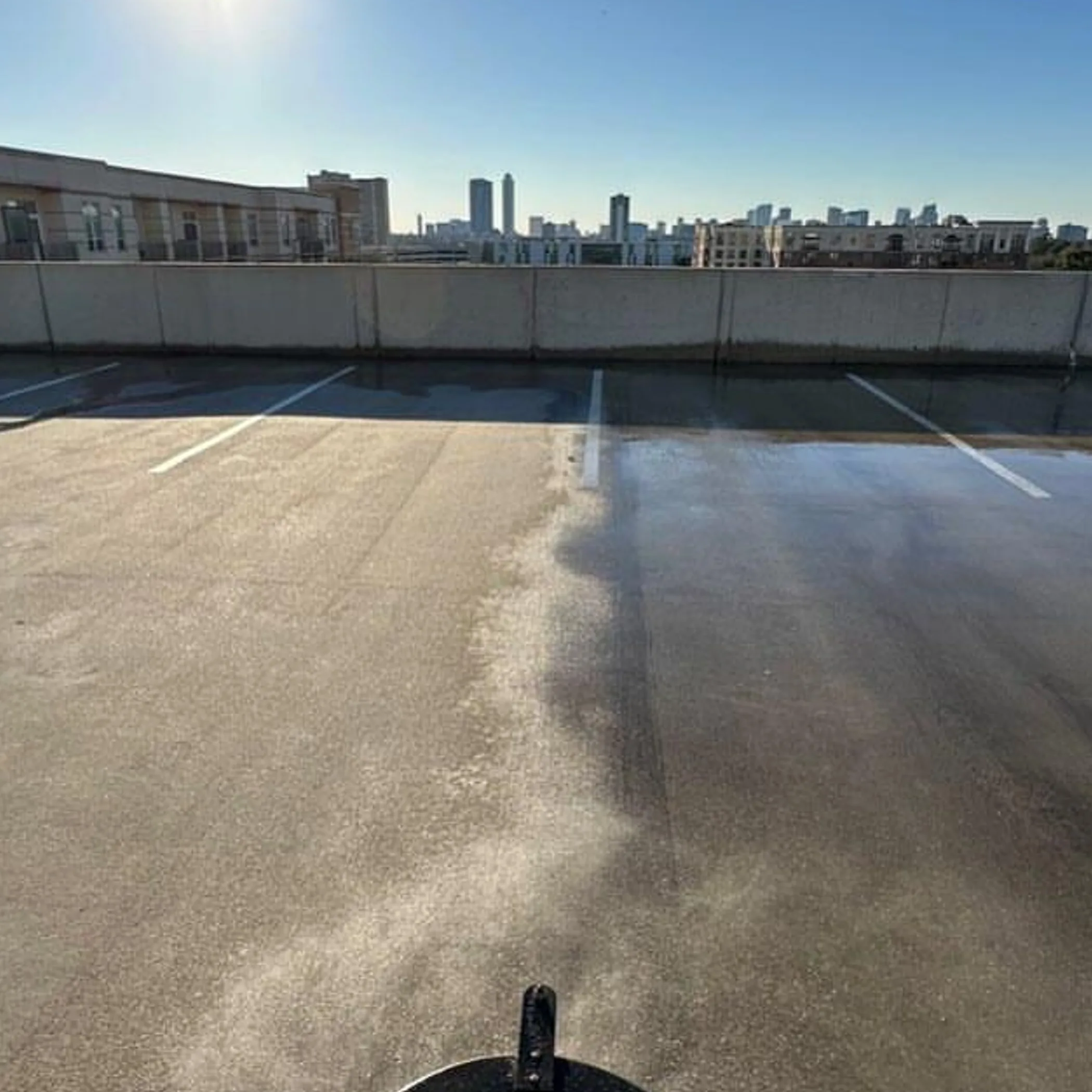 driveway being pressure washed outdoors