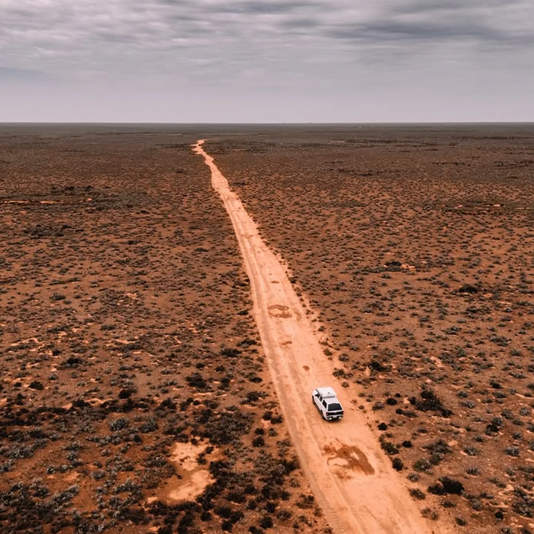 australian outback landscape with 4x4 vehicle